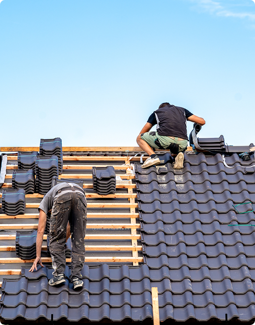 Tekton Roofing professionals working on a roof